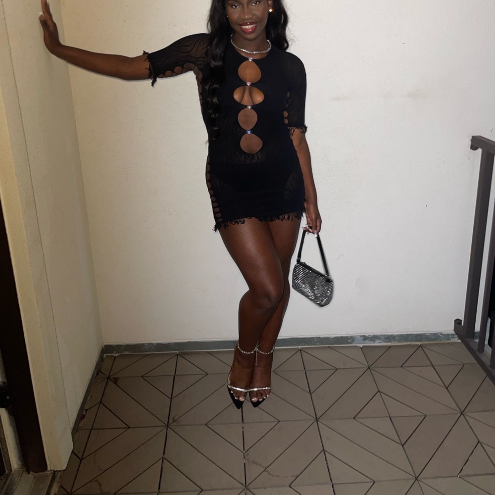Black Miranda poster girl dress